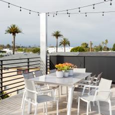 Modern Rooftop Patio With String Lights