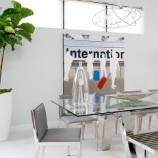 White Modern Dining Room With Airport Art