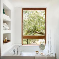 Wooden Window Highlights Tree-Lined View in Bathroom