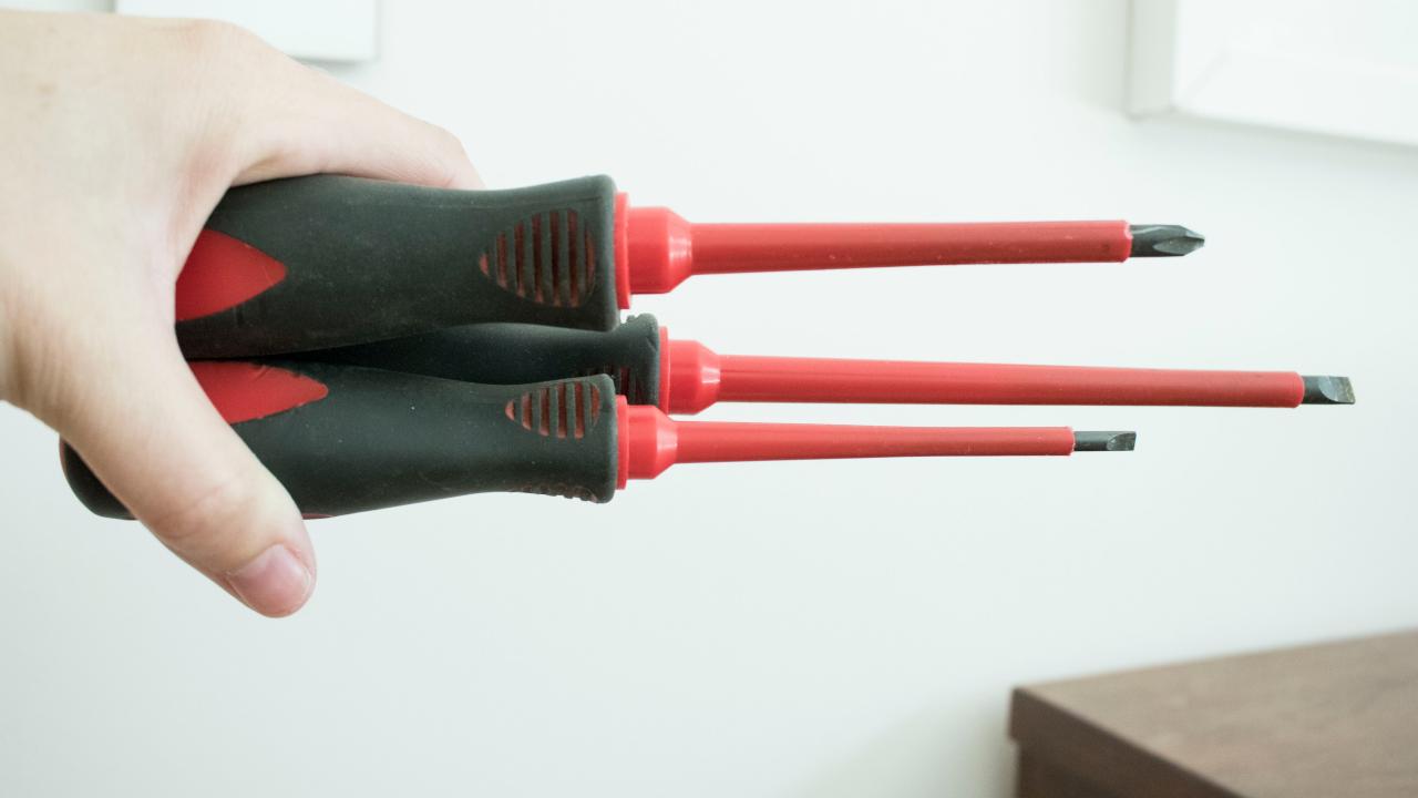 https://hgtvhome.sndimg.com/content/dam/images/hgtv/fullset/2018/6/19/3/Original_Emily-Fazio_Must-Have-DIY-Safety-Tools_insulated-screwdrivers-electrical.jpg.rend.hgtvcom.1280.720.suffix/1529434112516.jpeg