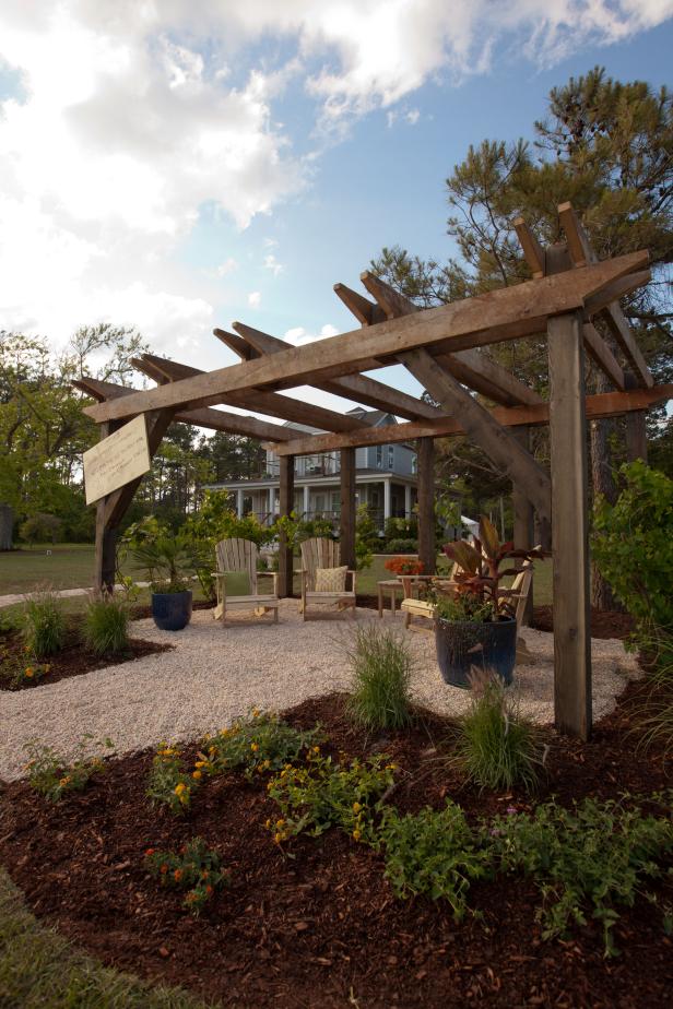 View Of 2013 Blog Cabin Through Rustic Pergola Hgtv