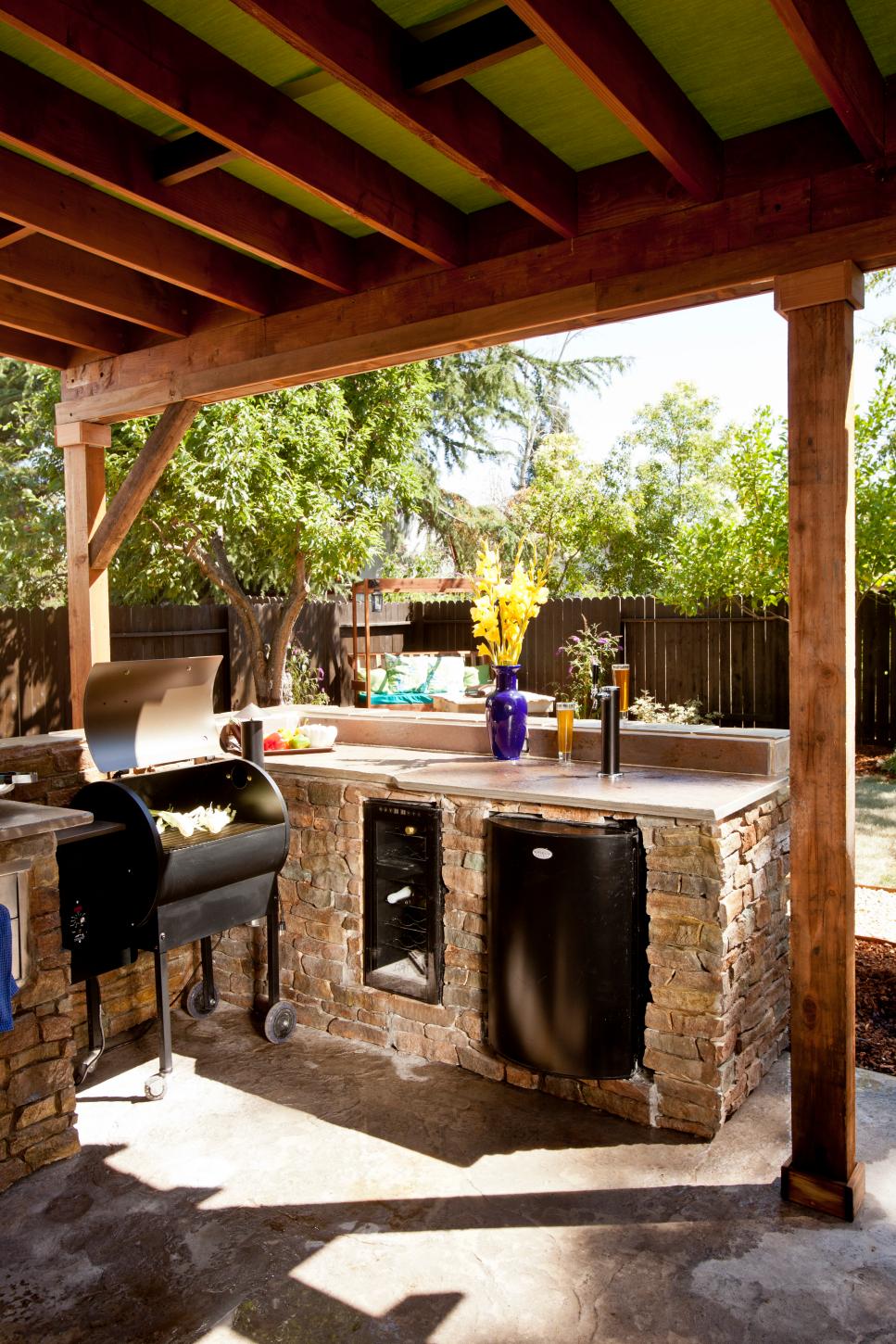 Outdoor Kitchen and Bar With Smoker, Fridge and Wine Cooler | HGTV