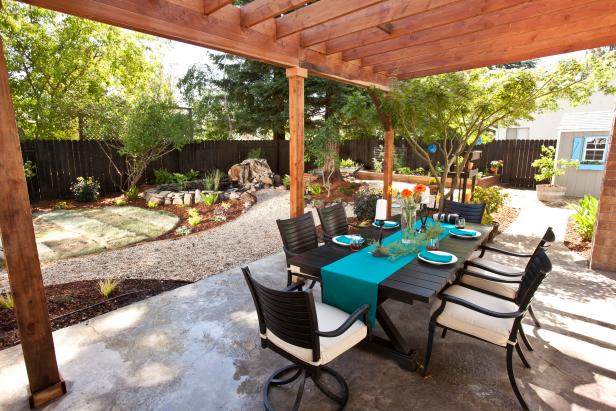 Contemporary Dining Area Under Pergola in Sunny Backyard | HGTV