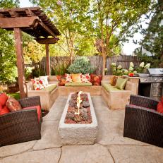 Flagstone Patio With Stone Seating Area and Fire Feature
