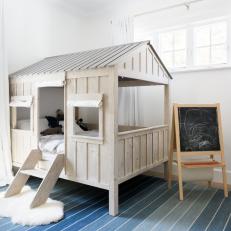 Neutral Kid Room With Playhouse Bed