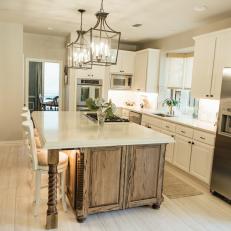 Traditional White Kitchen With Wood Base Work Island And Seating