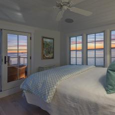 Coastal Master Bedroom With Sunset View