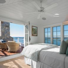 White Coastal Bedroom With Deck