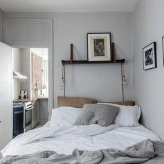 Small Gray Bedroom With Pendants