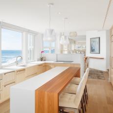 Modern Neutral Galley Kitchen With Ocean View