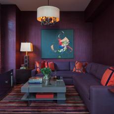 Modern Purple Living And TV Room With Modern Accents And Art