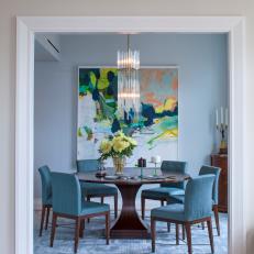 Contemporary Blue Dining Room With Modern Furnishings And Accents