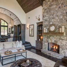 Rustic Living Room With Stone Fireplace
