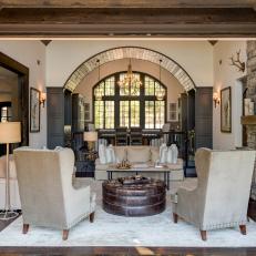 Rustic Great Room With Arched Window