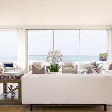 White Modern Living Room With Beach View
