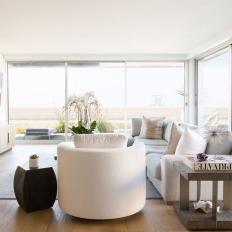 White Modern Living Room With Round Chair
