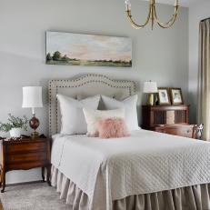 Neutral Traditional Bedroom With Pink Furry Pillow