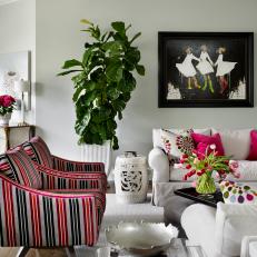 Pink and White Living Room With Striped Armchairs