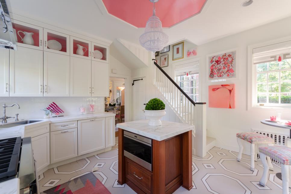 Pink and White Kitchen With Stairs