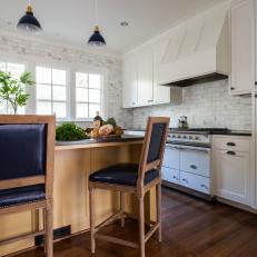 Eat-In Kitchen Balances Marble Backsplash, Hardwood Flooring