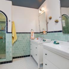 Green and White Double Vanity Bathroom With Arch