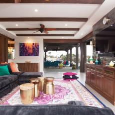 Eclectic Media Room With Pink Rug