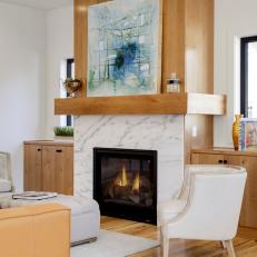 Great Room Features Wood Fireplace With Marble Surround