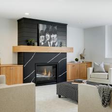 Contemporary Family Room Boasts Black Marble Fireplace