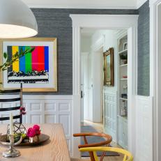 Eclectic Dining Room With Yellow Chair