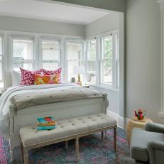 Multicolored Bedroom With Blue Rug