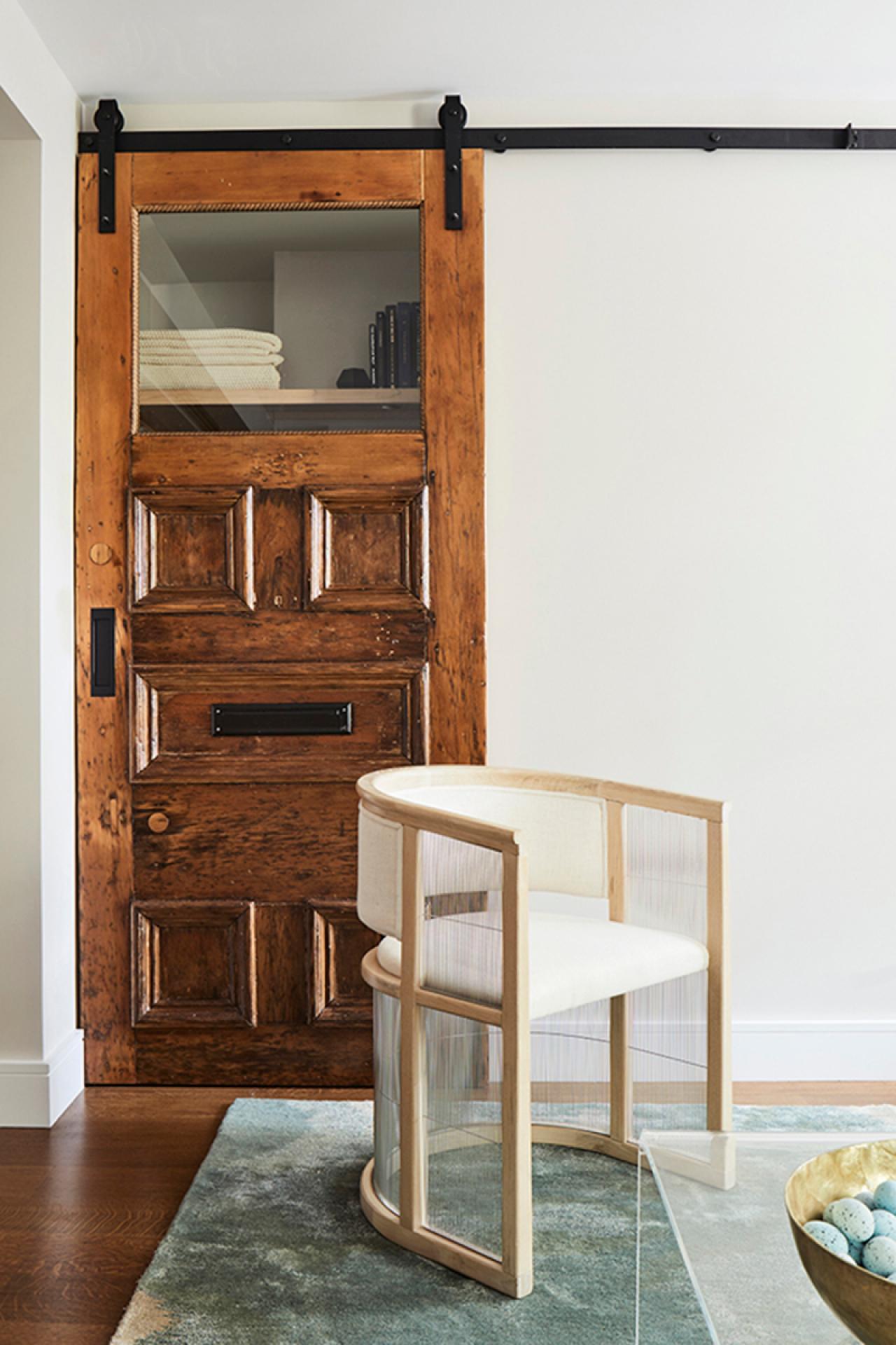 Upcycled Wooden Front Door Used As Barn Style Closet Door Hgtv