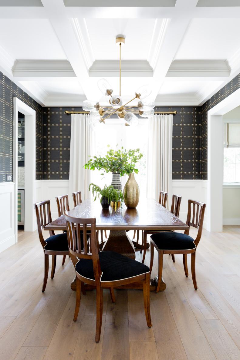 transitional dining room with coffered ceilings