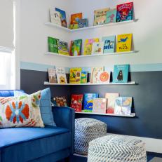 Floating Shelves, Sofa Create Reading Corner in Kids' Room