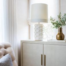 Cream-Colored Cabinet Offers Storage in Sitting Room