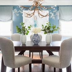 Formal Dining Room Features Tree-Inspired Fixture