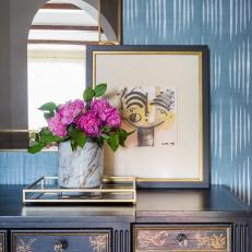 Eclectic Entryway With Dreamy Blue Backdrop