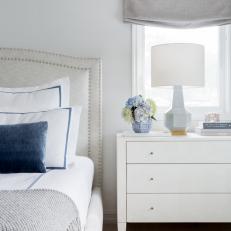 Soothing Neutral Master Bedroom With Studded Headboard