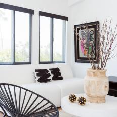 Layered Rugs Soften Modern Living Room