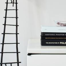 Climber Sculpture and Coffee Table Books