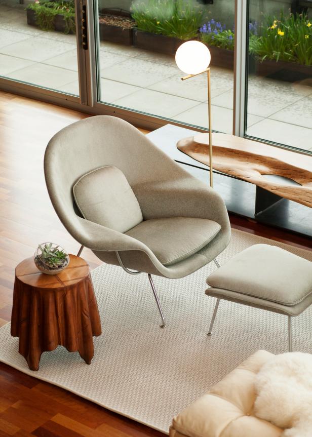 eclectic living room with womb chair