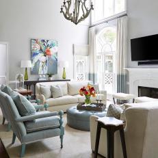 Gray Transitional Living Room With Blue Ottoman