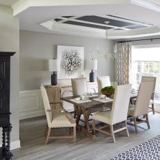 Neutral Transitional Dining Room With Tray Ceiling