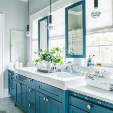Blue Bathroom With Mosaic Tile Floor