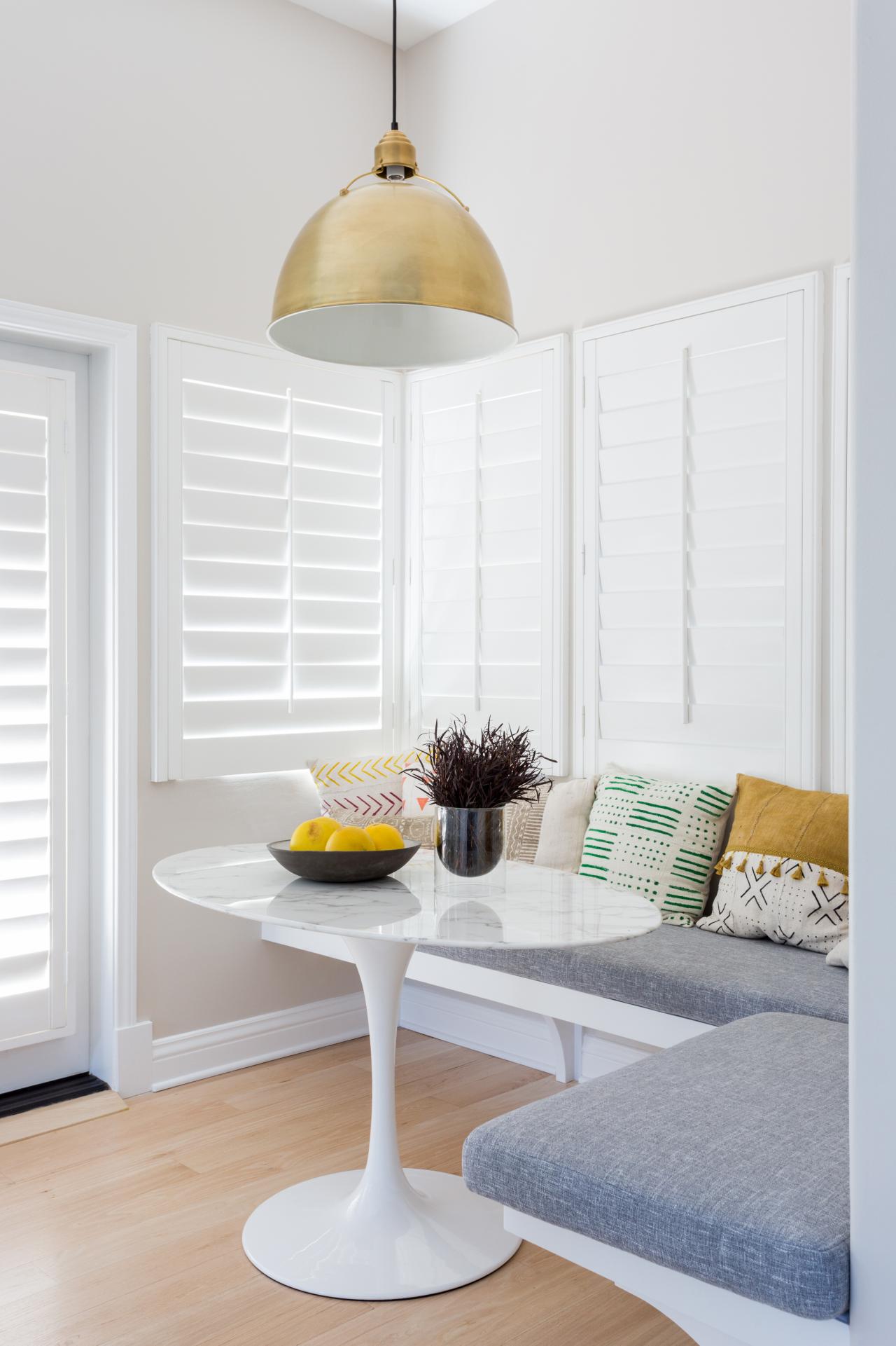 Midcentury Modern Breakfast Nook With Gray Upholstered Banquette