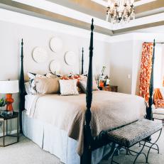 Contemporary Master Bedroom With Traditional Accents And Gold And Orange Highlights