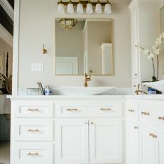 Contemporary White Master Bathroom With Marble And Gold Fixtures And Lighting