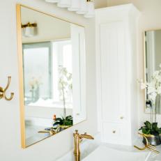 White Contemporary Master Bathroom Detail With Modern Bowl Sink And Gold Accents