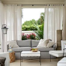 Contemporary Outdoor Living Room With White And Gray Accents