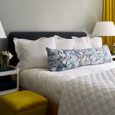 Modern White Guest Bedroom With Blue Upholstered Headboard And Yellow Accents