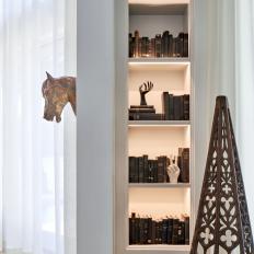 Contemporary Illuminated Built In Book Shelf With Antique Accents